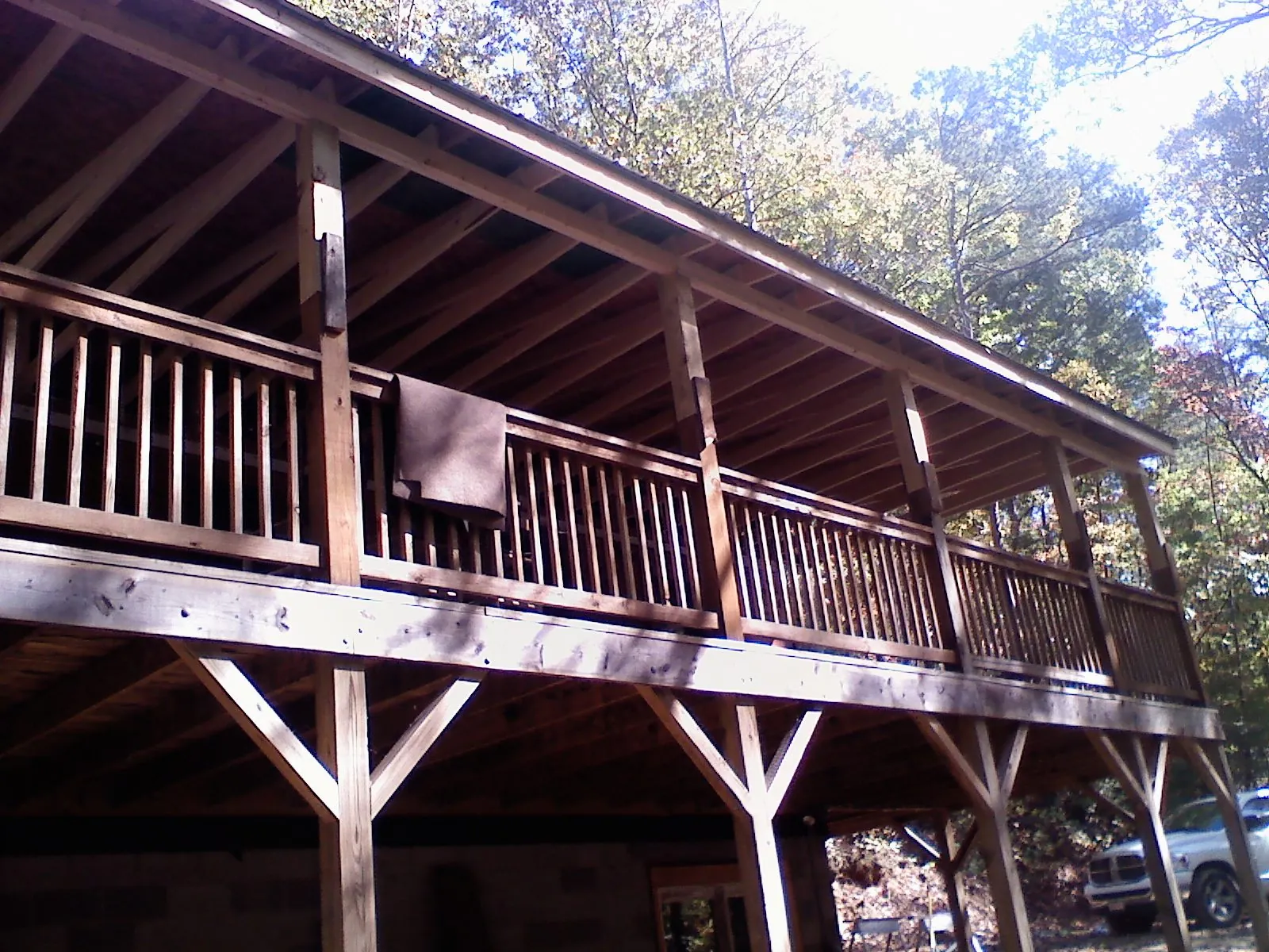Timber framing under a new elevated porch and deck — Roof Leak Repair in Prague by Roofing Brothers